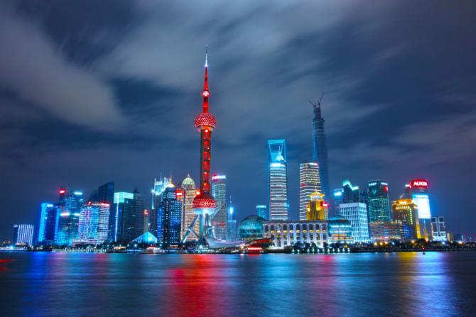 night-skyline-with-bright-lights-in-shanghai-china.jpg
